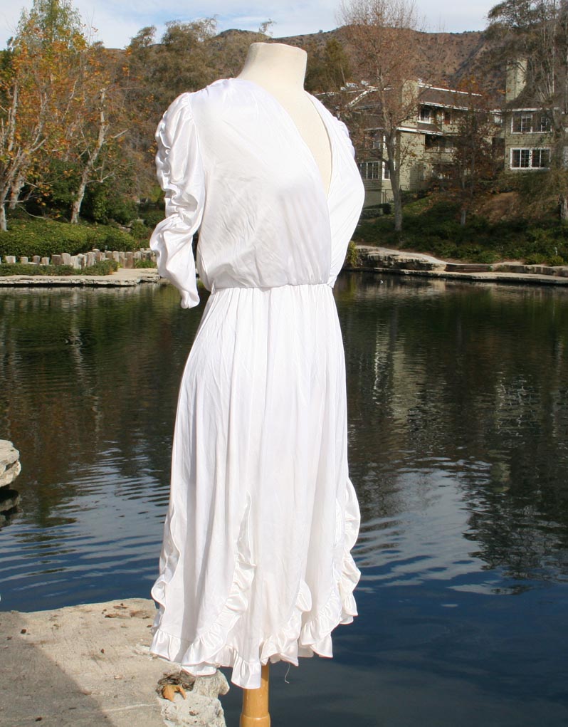 White Ruffle Sleeve And Bottom Border Dress