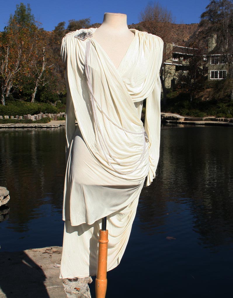 White With Draped Pearls And Shoulder And Hip Brochee
