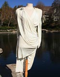 White With Draped Pearls And Shoulder And Hip Brochee