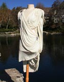 White With Draped Pearls And Shoulder And Hip Brochee