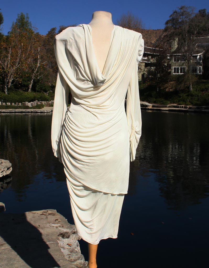 White With Draped Pearls And Shoulder And Hip Brochee