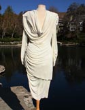 White With Draped Pearls And Shoulder And Hip Brochee
